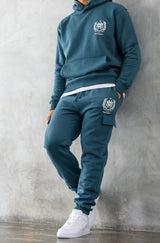 CREST JOGGERS - TEAL