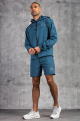 STARFIRE WINDBREAKER JACKET - LT PETROL