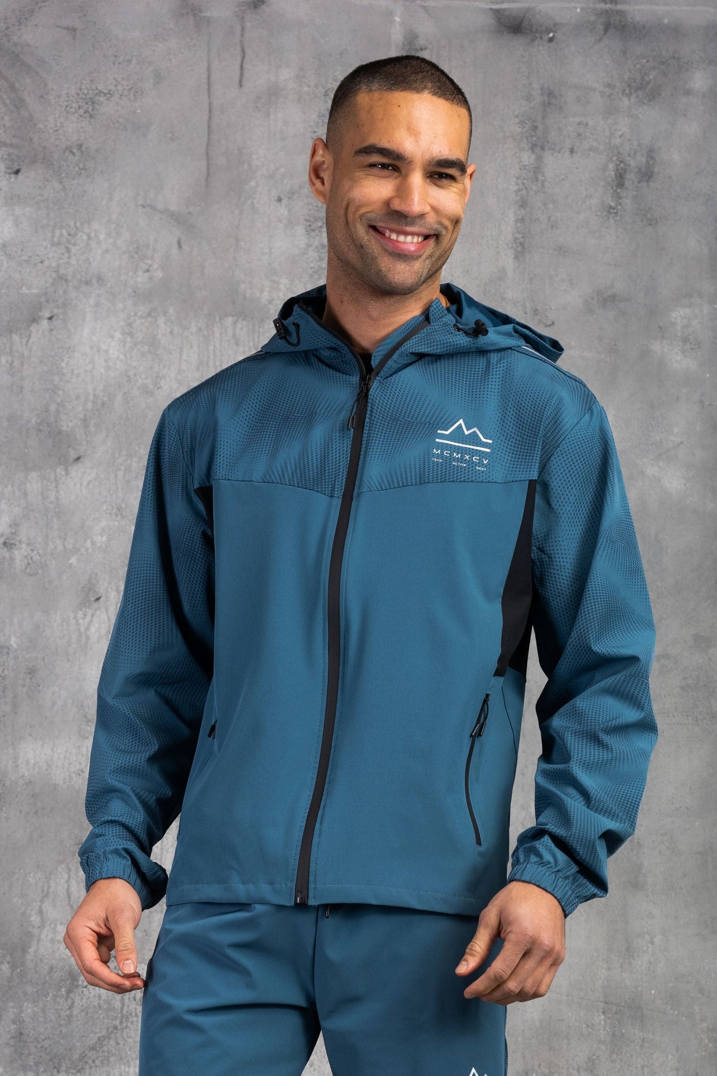 STARFIRE WINDBREAKER JACKET - LT PETROL