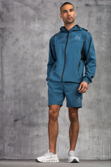STARFIRE WINDBREAKER JACKET - LT PETROL