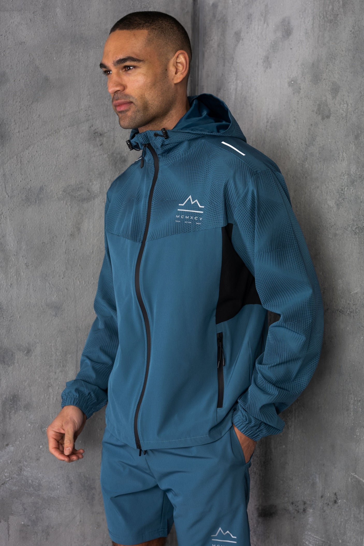 STARFIRE WINDBREAKER JACKET - LT PETROL