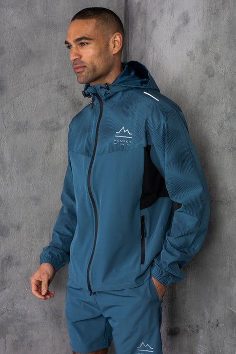 STARFIRE WINDBREAKER JACKET - LT PETROL